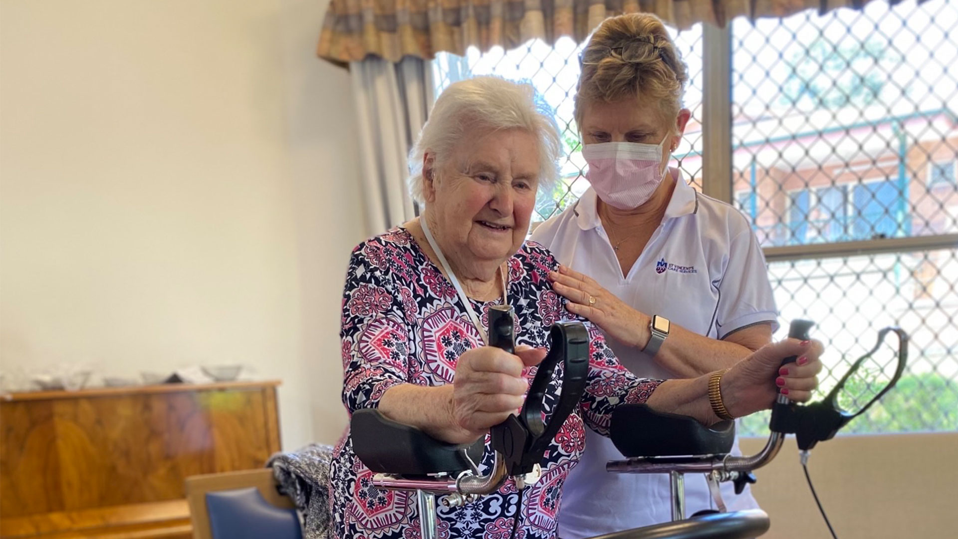 aged care resident at carseldine doing exercises with physio